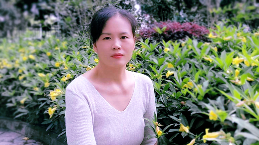周喜梅.jpg